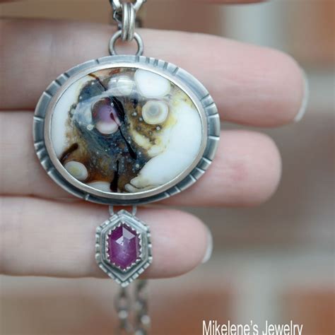 Silver artisan pendant with glass cabochon. hand fabricated  